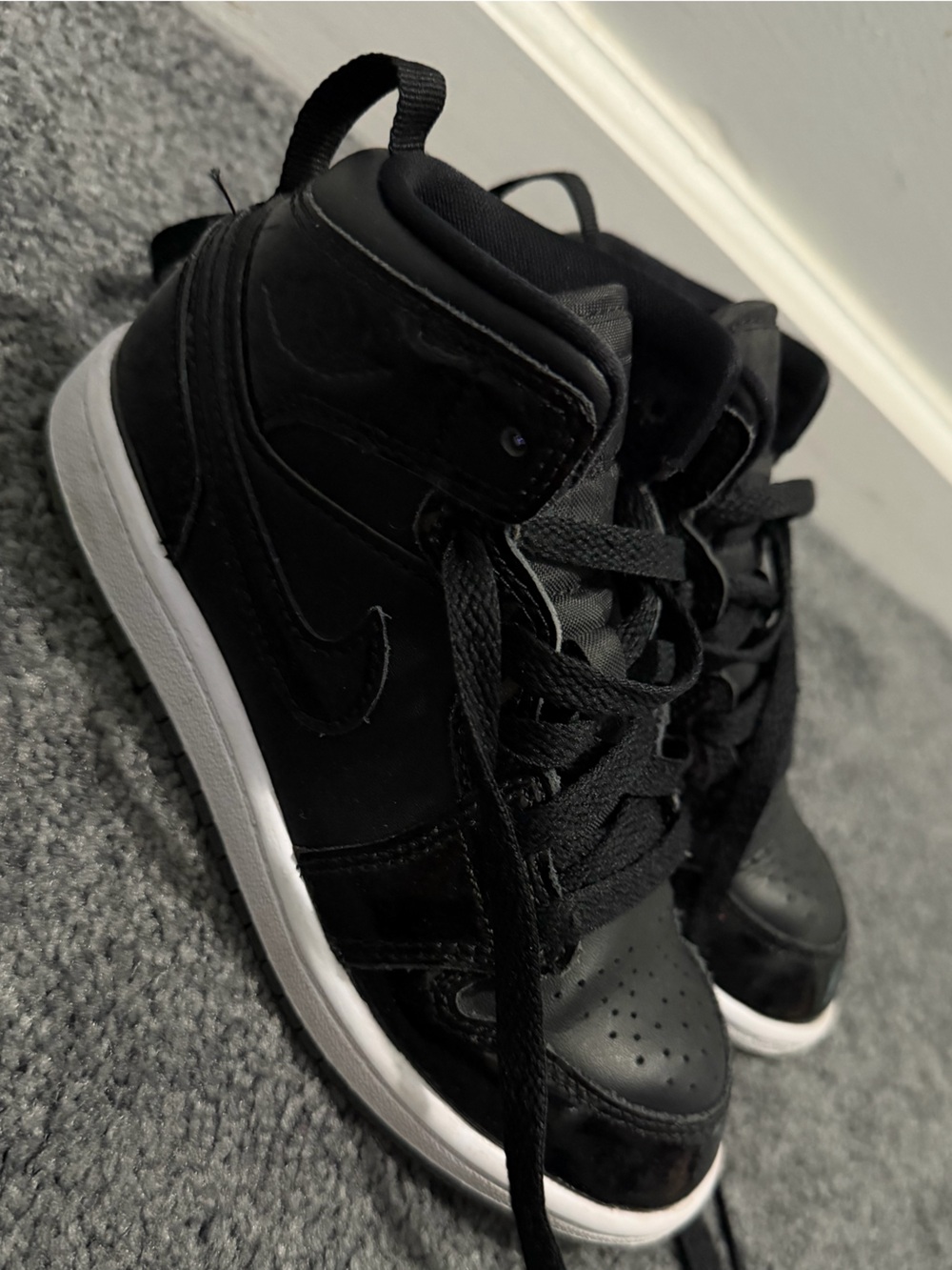 Jordan Kids Black and White High-Top Sneakers